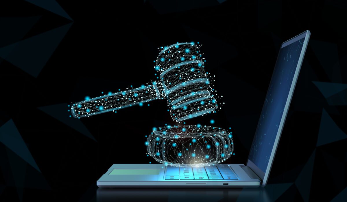 Internet law concept with 3d rendering computer notebook display gavel judge